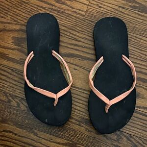 Reef Black and Orange Flip Flops